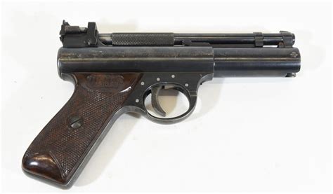 <b>22</b> Grip designed to fit the hand, with thumb rest and checkering Positively locked barrel using the famous <b>Webley</b> revolver-type stirrup Rear sight with vertical and horizontal adjustment Manual safety catch (i. . Webley pistol 22